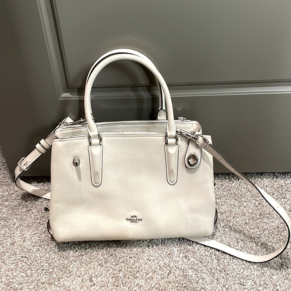 8 pocket off white cross body Coach Bag